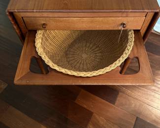 C88 - $850. 1950's Sewing Table AT-33 Hans Wegnar (by Anders Tuck) Minor imperfection noted in the picture. Measures 25.5" wide x 22.5" deep x 24" tall. Two Drop leaves are each 10.75" wide.