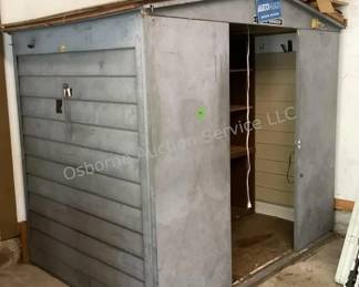 Metal Shed (inside garage, buyer to remove)