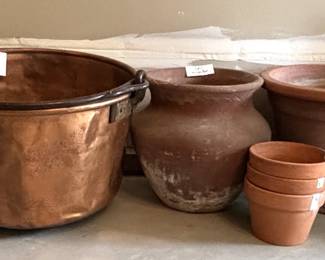 Copper Kettle and clay flower pots.