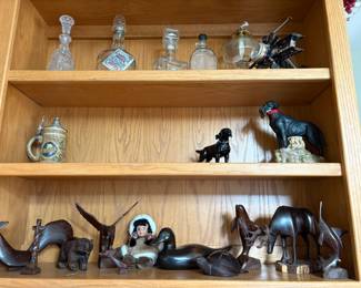 Carved animals, decanters, stein