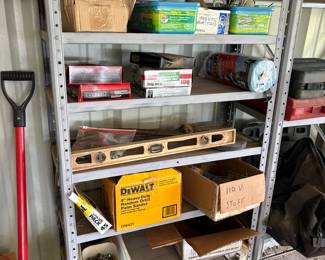 shelving, electrical and plumbing supplies, palm sander