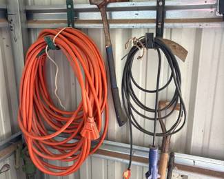 extension cord, axe, trouble light