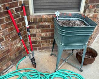 wash tub planter, hose, loppers