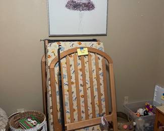 More toys and Barbie stuff, crib