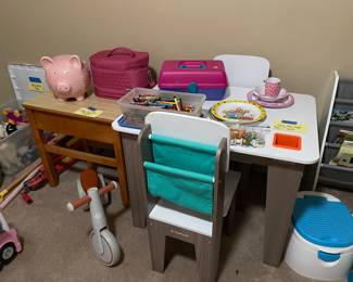 Children’s desk and chairs, awesome pink piggy bank, etc.