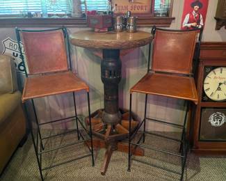 Pair of leather barstools and decorative table 