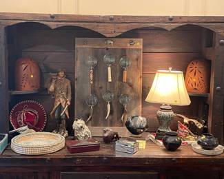 Black pottery from Oaxaca, terra-cotta light covers, carved wooden buffalo