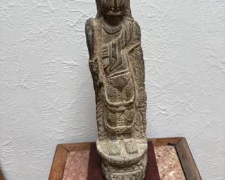 Carved stone figure