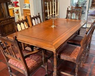 Antique Jacobean style oak dining table with 2 armchairs and 4 side chairs