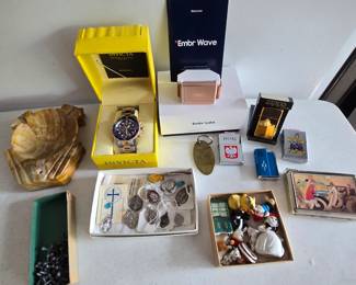 Vintage items, religious medals, Invicta watch, lights