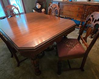 Antique dining table & 6 chairs with embroidered cushions