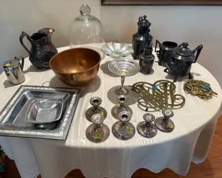 The copper pot is actually 100% copper and $15
The four piece coffee, tea set is from 1889 Manufactured & plated by Need & Barton ( 2420 ) -$75
The square large and square small set are from “Towel silver Smith since 1699”made in India - $30