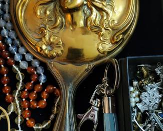 Antique hand mirror and brush set