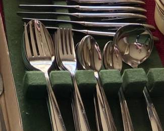 Unused Star Burst Silverware set for 10