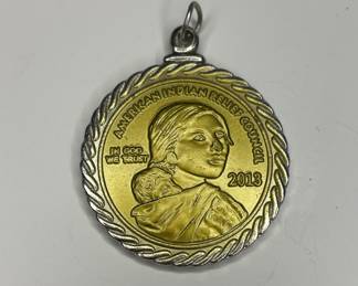 American Indian Relief Council coin pendant