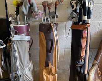 Vintage golf clubs and bags