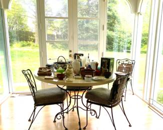 Wrought iron kitchen or patio set. Table top is removable w/woven wrought iron top beneath