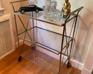 Vintage brass car cart on large casters