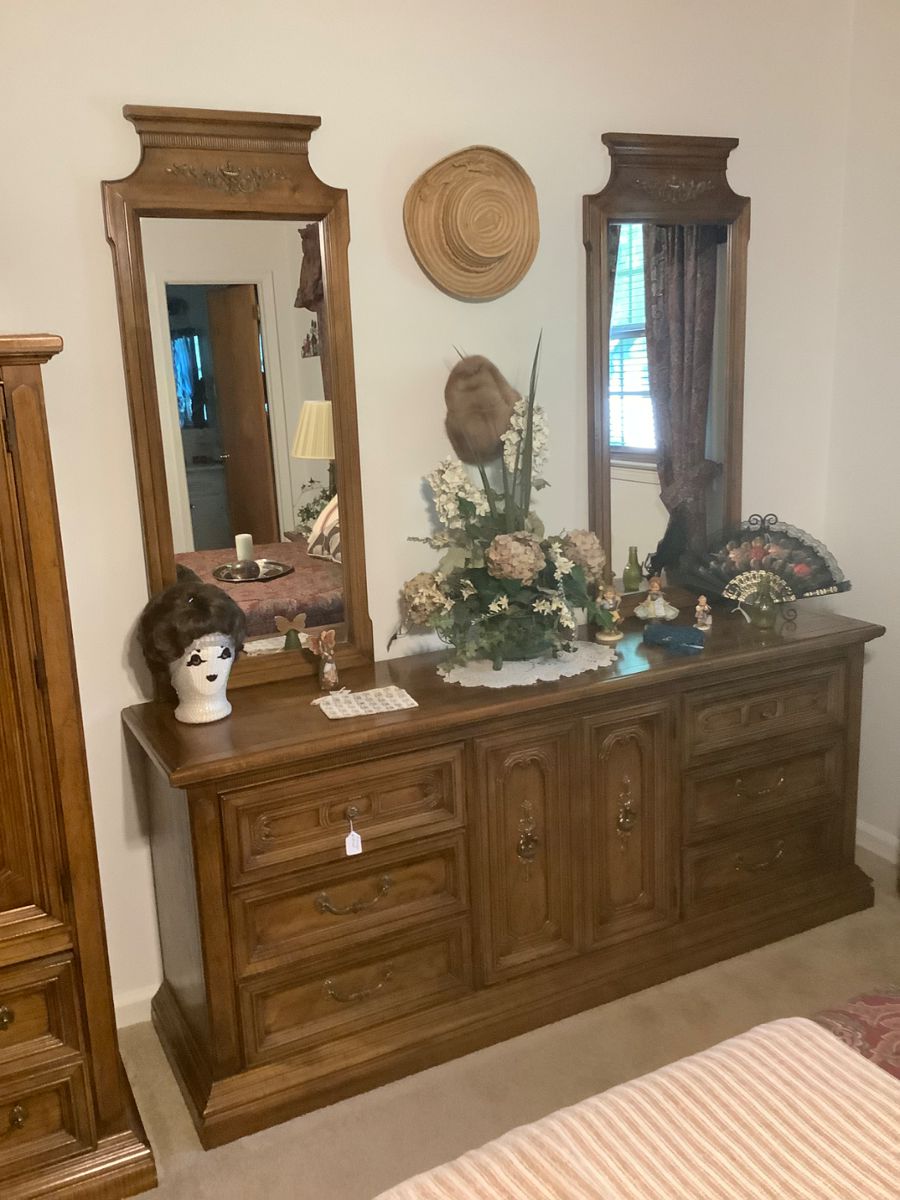 The walnut dresser with 2 mirrors and,lot's of drawers. Dresser measures 72” wide x 18” wide. 31” height. Price is: 385.00