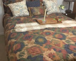Sleigh Queen size bed with mattress and box springs. Measures: 63” width, 90 3/4” long. Price: 625.00