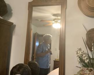One of the 2 mirrors on walnut dresser. Each one measures 48” height x21” wide. Mirrors go with dresser. Price of the dresser: 385.00