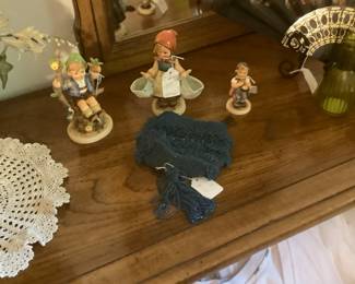 Dresser has several drawers, lots in center behind the door and on side. Two mirrors go with dresser. 385.00