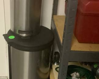 2 stainless garbage cans.