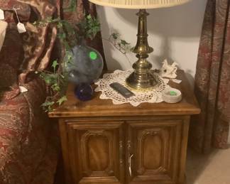 The end table measures: 26” wide x 16” depth x 23” tall. Two door.