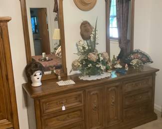 The walnut dresser with 2 mirrors and,lot's of drawers. Dresser measures 72” wide x 18” wide. 31” height. Price is: 385.00