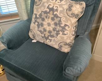 Blue chair. Rock and swivels. Measures 32 1/2” width, 35 1/2” tall. Price: 85.00 Excellent condition.