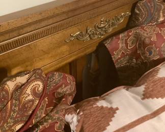 Design on the walnut bed on headboard. Bed measures 83” long x 60” wide 25” height. Price with mattress: 450.00