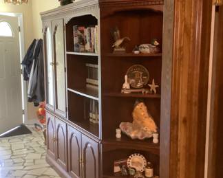 Entertainment Center in foyer: Measures: 90” wide, 20 3/4” depth, 73” tall. Price: 375.00