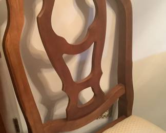 Close up of back of chairs.