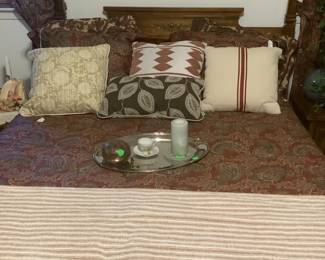 2 posts on walnut bed. Comforter and pillows are not included.