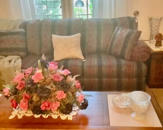 The couch in the living room is a sleeper sofa. Couch and chair are by Huntington House. Couch measures: 82” long x 36 1/2” depth x 18” tall. Price is: 260.00. Both of these pieces are like brand new.