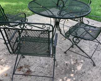 Black metal table and chairs.