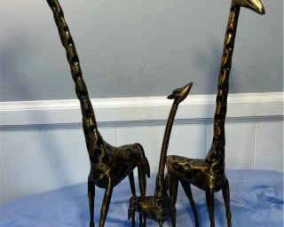  04 A Trio Of Metal Giraffes