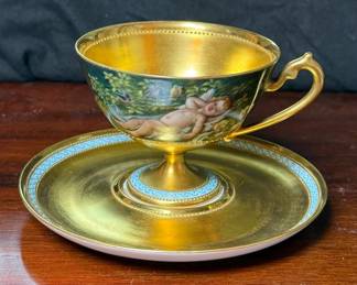 Antique Dresden teacup with cherub