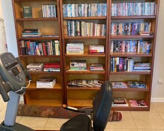 Shelves made by hand. Measure 7’ 1” tall  A lot of books…