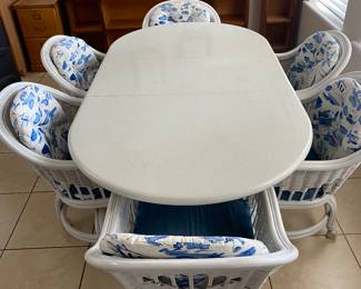 Dinning room table with 6 chairs. Table has leaf on it on this picture.