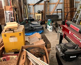 tobaggon, wood scraps, shovels, spreader, log splitter