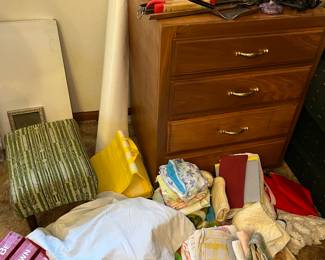 small dresser, towels, misc