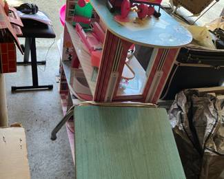 giant doll house, vintage booster chair, baby carriage