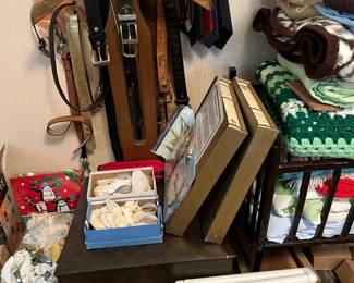 cradle, blankets, garment rack/seat