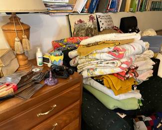 lamp, blankets, towels, pillows, sofa