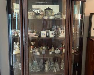 Beautiful Antique Bow Front Cabinet on rolling Claw Feet