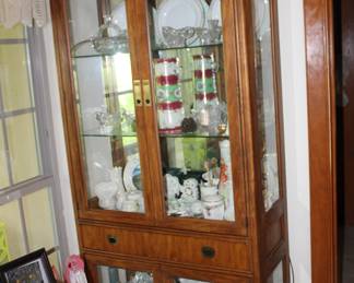 Drexel lighted display cabinet, four doors and beveled glass