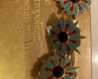 Met reproduction earrings and pin