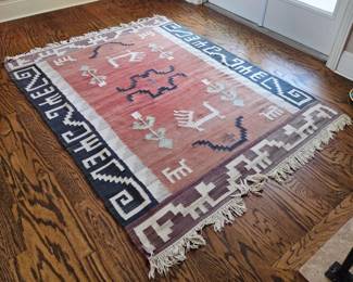 Rug measurements: 5' x 7'