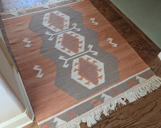 Rug measurements: 5'3" x 4'2"